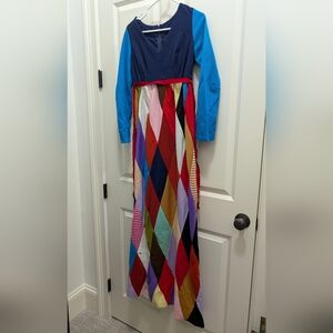 Vintage Handmade 1970s Patchwork Quilt Dress It is a true piece of wearable art.